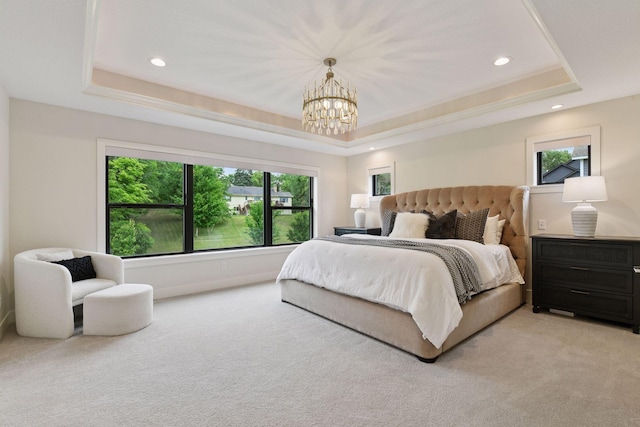 4998 Beach St NE, Prior Lake, MN 55372 - carpeted bedroom with a tray ceiling, a chandelier, and recessed lighting