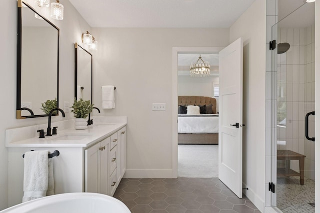 4998 Beach St NE, Prior Lake, MN 55372 - full bath featuring ensuite bathroom, double vanity, a stall shower, baseboards, and tile patterned floors
