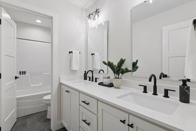 4998 Beach St NE, Prior Lake, MN 55372 - full bath with toilet, double vanity, bathtub / shower combination, and recessed lighting