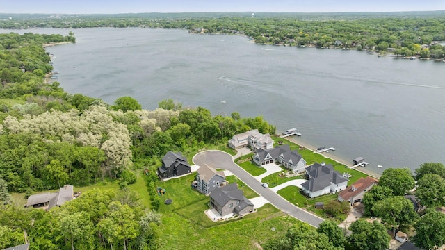 4998 Beach St NE, Prior Lake, MN 55372 - aerial view of property's location with a large body of water, nearby suburban area, and a forest