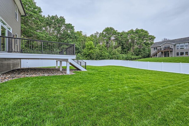 139 144th Ave NW, Andover, MN 55304 - fenced yard with stairway and a deck