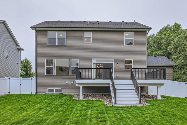 139 144th Ave NW, Andover, MN 55304 - rear view of property featuring stairs, a gate, a deck, and roof with shingles