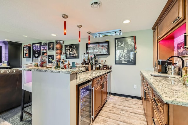 13812 Steven Rd, Burnsville, MN 55337 - indoor bar featuring wine cooler, light wood-type flooring, decorative light fixtures, and recessed lighting