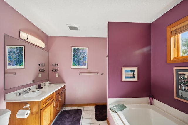 15795 Quebec Cir, Eden Prairie, MN 55346 - bathroom with double vanity, a garden tub, and tile patterned floors