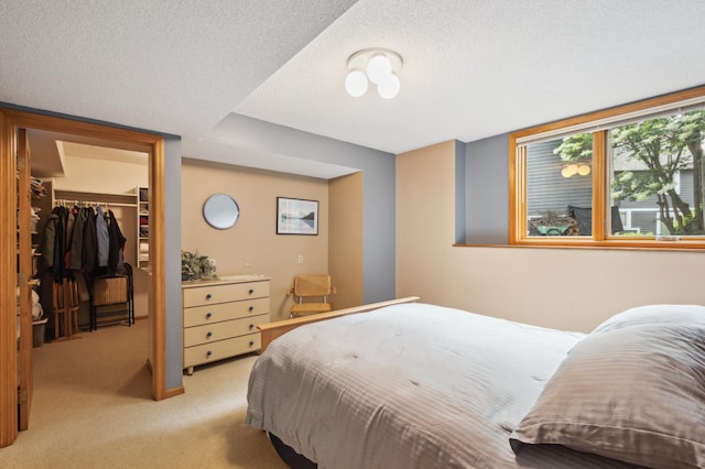 15795 Quebec Cir, Eden Prairie, MN 55346 - bedroom featuring a walk in closet, light carpet, and a closet