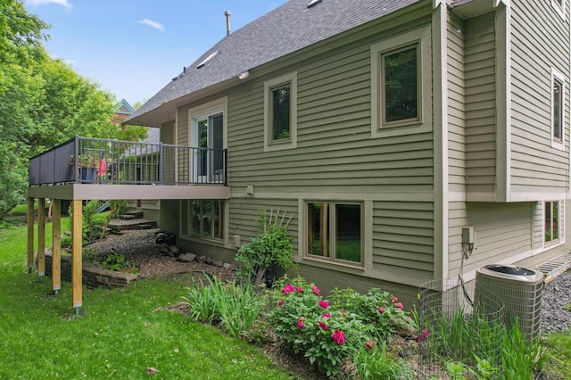 15795 Quebec Cir, Eden Prairie, MN 55346 - back of house featuring a deck and a lawn