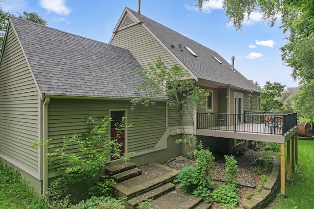 15795 Quebec Cir, Eden Prairie, MN 55346 - back of property with a wooden deck and a shingled roof