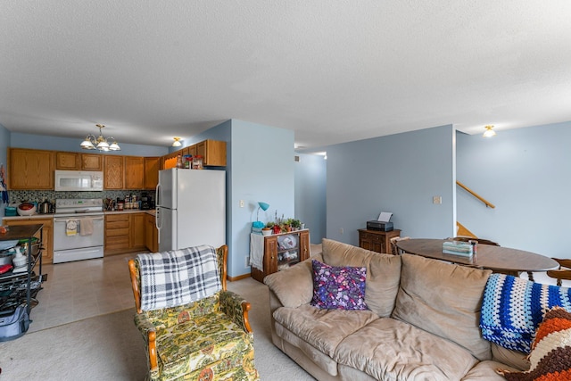 1587 County Road D E Unit B, Maplewood, MN 55109 - living area with a chandelier, a textured ceiling, and stairway