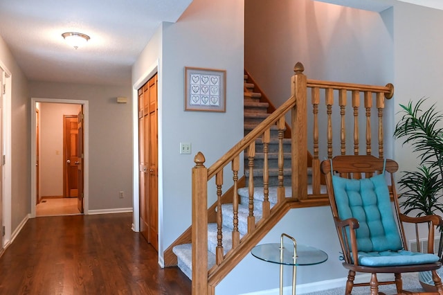 6490 White Dove Dr, Excelsior, MN 55331 - stairway with wood finished floors and baseboards