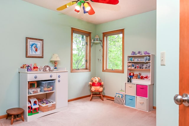 6490 White Dove Dr, Excelsior, MN 55331 - recreation room with carpet flooring, a ceiling fan, and baseboards