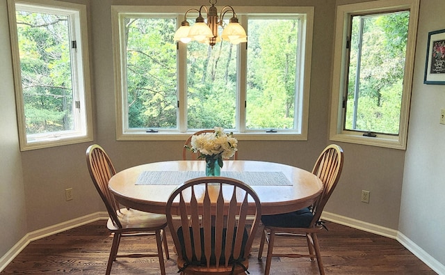 6490 White Dove Dr, Excelsior, MN 55331 - dining space with a chandelier, baseboards, and dark wood finished floors