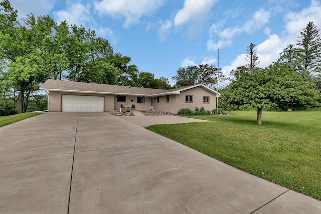 1341 75th Ave NE, Sauk Rapids, MN 56379 - ranch-style home featuring concrete driveway, a garage, and a front lawn