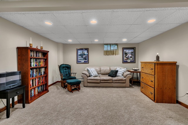 1341 75th Ave NE, Sauk Rapids, MN 56379 - living room featuring carpet floors, recessed lighting, a paneled ceiling, and a baseboard heating unit