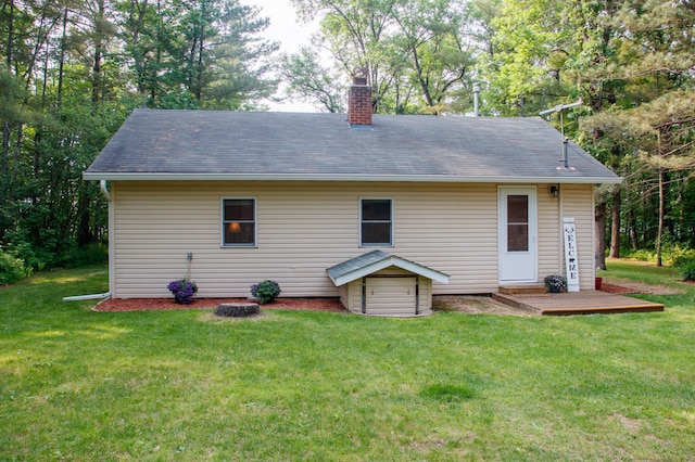 15088 Shady Oak Ln, Center Twp, MN 56465 - back of property with a chimney, a lawn, and a shingled roof