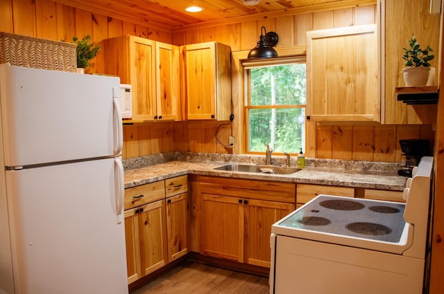 15088 Shady Oak Ln, Center Twp, MN 56465 - kitchen featuring white appliances, wood walls, wood ceiling, and light wood-style floors