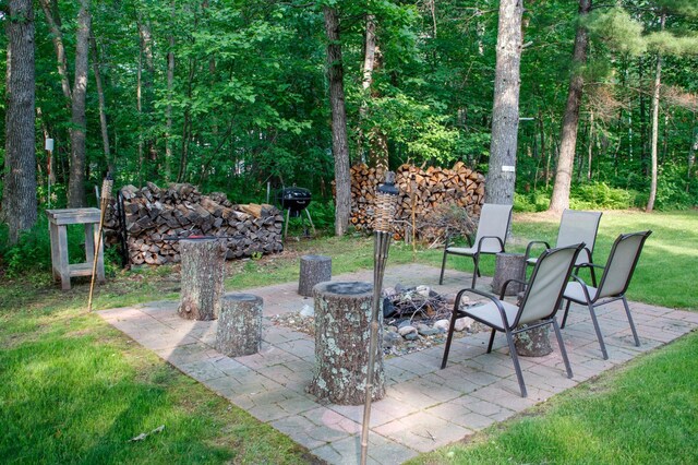 15088 Shady Oak Ln, Center Twp, MN 56465 - view of patio / terrace with a fire pit