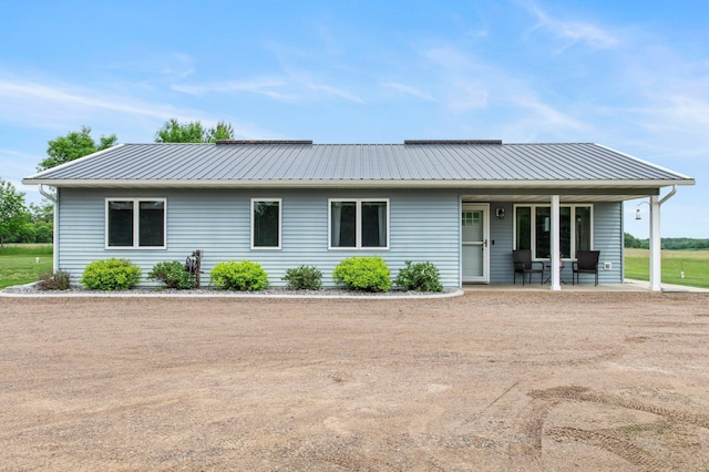 32147 111 1/2 St, Baldwin Twp, MN 55371 - view of front of home with covered porch and metal roof