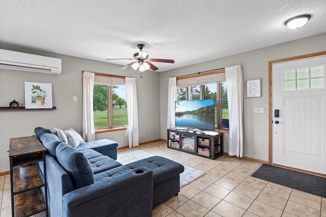 32147 111 1/2 St, Baldwin Twp, MN 55371 - living room featuring a wall mounted air conditioner, plenty of natural light, baseboards, and a textured ceiling