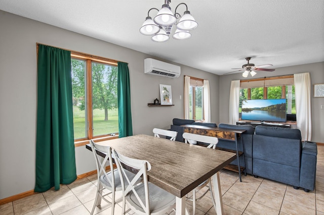 32147 111 1/2 St, Baldwin Twp, MN 55371 - dining space featuring a wall mounted air conditioner, a chandelier, light tile patterned floors, a textured ceiling, and ceiling fan