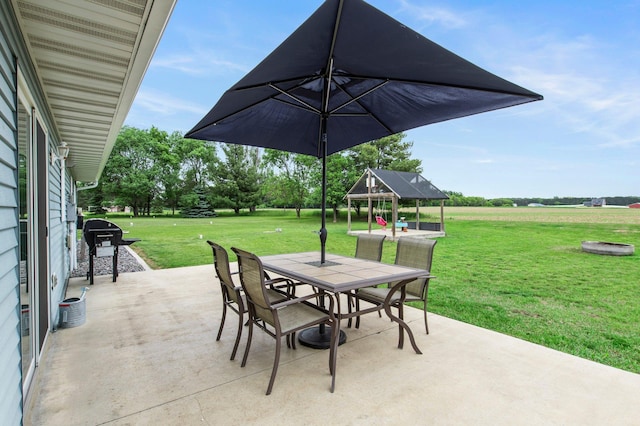 32147 111 1/2 St, Baldwin Twp, MN 55371 - view of patio with outdoor dining area, a gazebo, and a grill