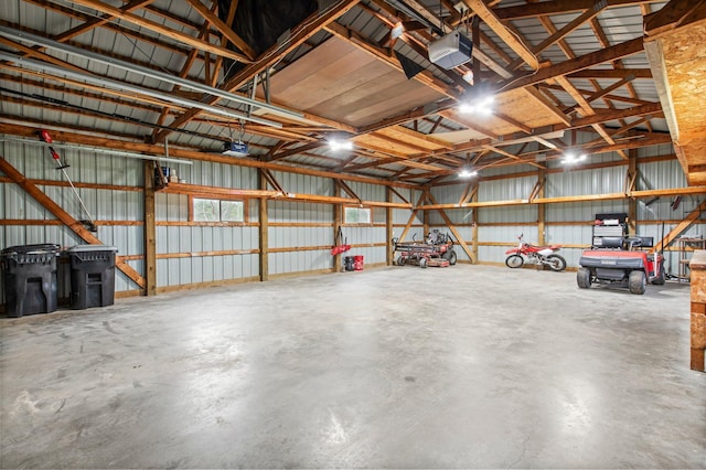 32147 111 1/2 St, Baldwin Twp, MN 55371 - garage featuring metal wall and a garage door opener