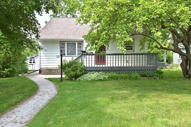 619 9th Ave, Grand Rapids, MN 55744 - view of front of property featuring a front lawn and roof with shingles