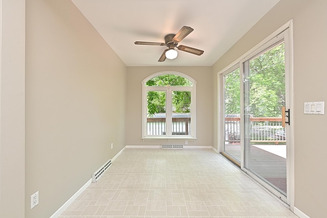 619 9th Ave, Grand Rapids, MN 55744 - unfurnished room with a ceiling fan, baseboards, and plenty of natural light