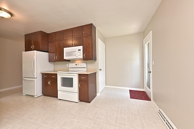 619 9th Ave, Grand Rapids, MN 55744 - kitchen with white appliances, baseboards, light countertops, baseboard heating, and dark brown cabinetry