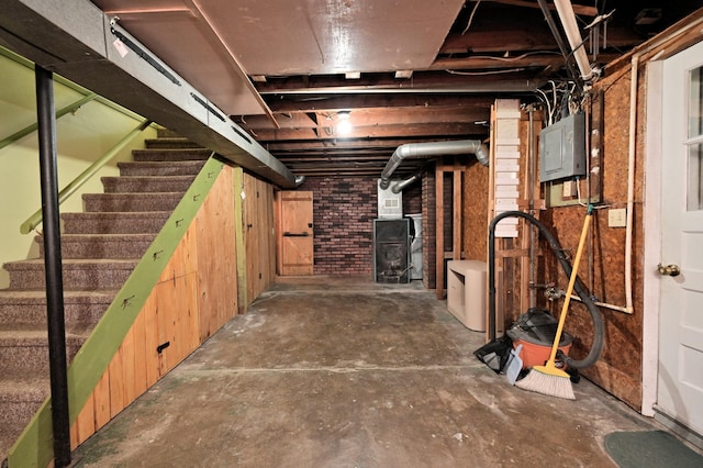 619 9th Ave, Grand Rapids, MN 55744 - unfinished basement with electric panel and stairway
