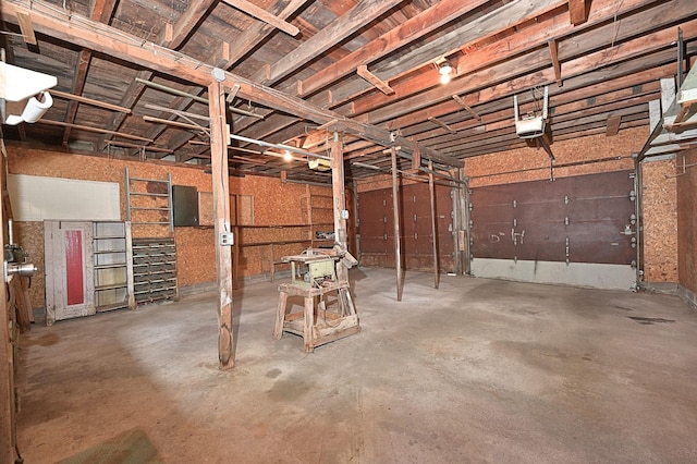 619 9th Ave, Grand Rapids, MN 55744 - garage with a garage door opener