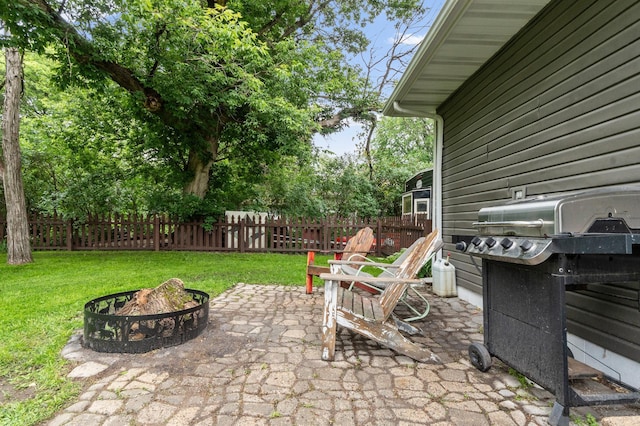 712 Shady Ln SW, Alexandria, MN 56308 - view of patio / terrace with a fire pit and a grill