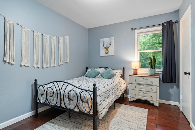 712 Shady Ln SW, Alexandria, MN 56308 - bedroom featuring wood-type flooring and vaulted ceiling