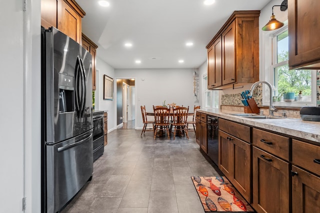 712 Shady Ln SW, Alexandria, MN 56308 - kitchen featuring refrigerator with ice dispenser, recessed lighting, range, light countertops, and dishwasher