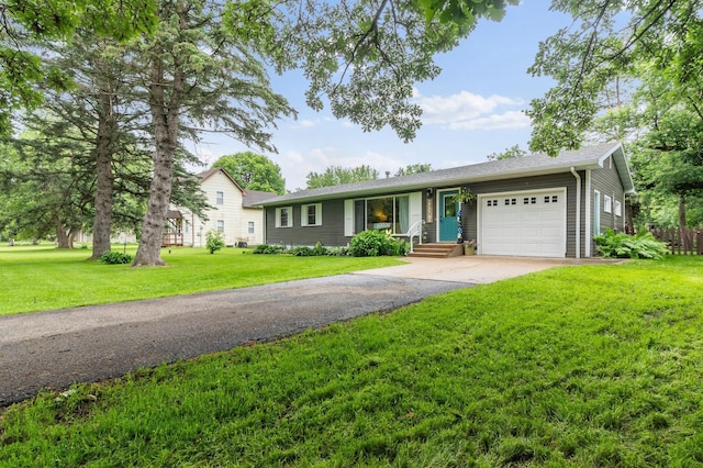 712 Shady Ln SW, Alexandria, MN 56308 - single story home with an attached garage, asphalt driveway, and a front yard