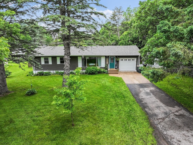712 Shady Ln SW, Alexandria, MN 56308 - ranch-style home featuring asphalt driveway, an attached garage, a front yard, and a shingled roof