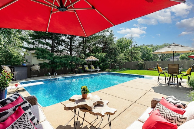 4078 153rd St W, Rosemount, MN 55068 - view of pool with a patio area, a fenced backyard, a diving board, and outdoor dining space