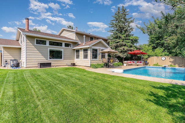 4078 153rd St W, Rosemount, MN 55068 - back of house with a fenced backyard, a patio, and an outdoor hangout area