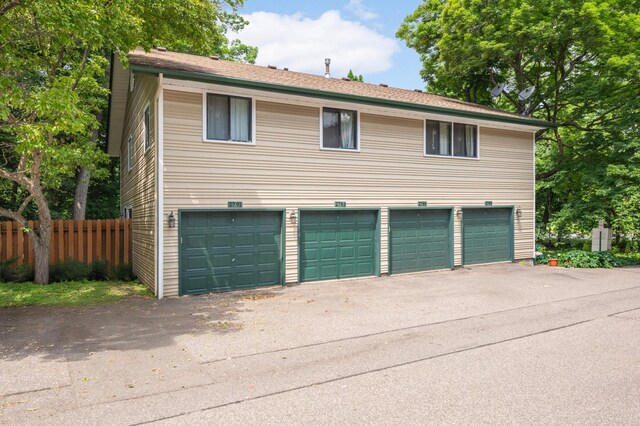 2783 Upland Ct, Plymouth, MN 55447 - view of front facade with asphalt driveway