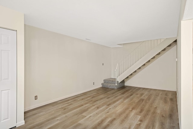 2783 Upland Ct, Plymouth, MN 55447 - unfurnished living room featuring light wood-style floors and stairway