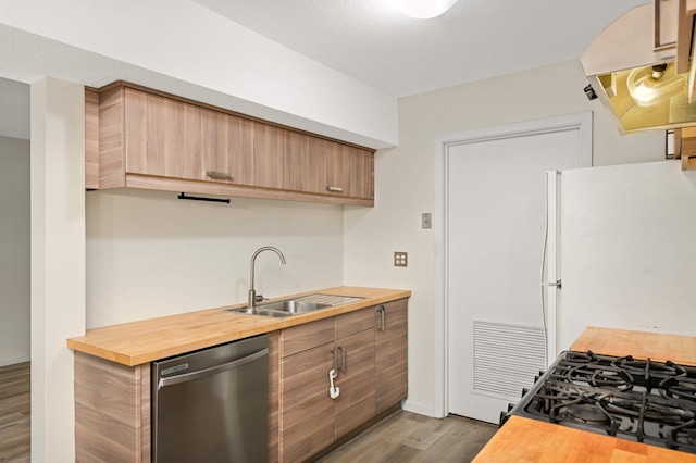 2783 Upland Ct, Plymouth, MN 55447 - kitchen with stainless steel dishwasher, wooden counters, wood finished floors, and range hood