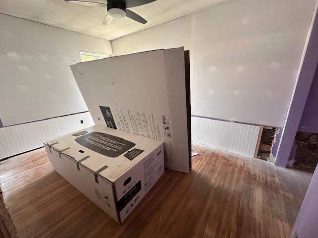 709 Summit St, Aurora, MN 55705 - empty room with wood finished floors and ceiling fan