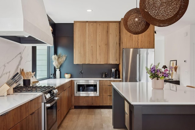 4968 40th St, Saint Louis Park, MN 55416 - kitchen featuring stainless steel appliances, premium range hood, modern cabinets, and recessed lighting