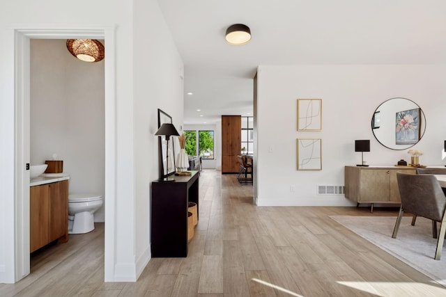 4968 40th St, Saint Louis Park, MN 55416 - hall featuring light wood finished floors and recessed lighting