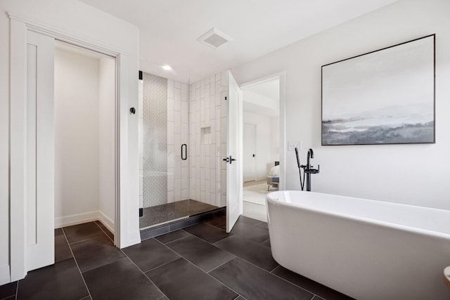4968 40th St, Saint Louis Park, MN 55416 - full bath with a stall shower, a soaking tub, and tile patterned flooring