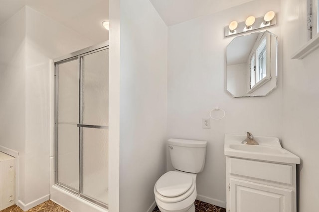 115 Spruce St W, Grey Eagle, MN 56336 - bathroom featuring baseboards, a shower stall, toilet, and vanity
