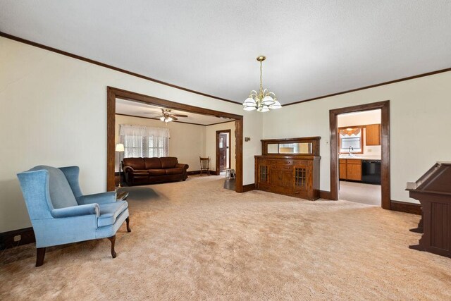 115 Spruce St W, Grey Eagle, MN 56336 - living room featuring ornamental molding, healthy amount of natural light, a chandelier, and light colored carpet