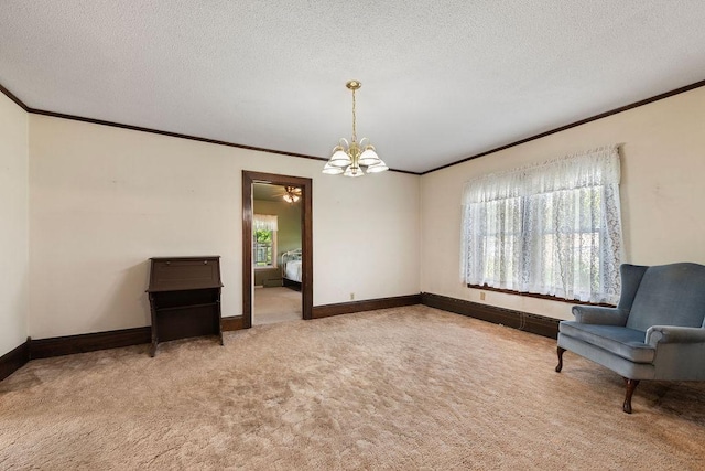 115 Spruce St W, Grey Eagle, MN 56336 - unfurnished room featuring ornamental molding, carpet floors, a chandelier, and a textured ceiling