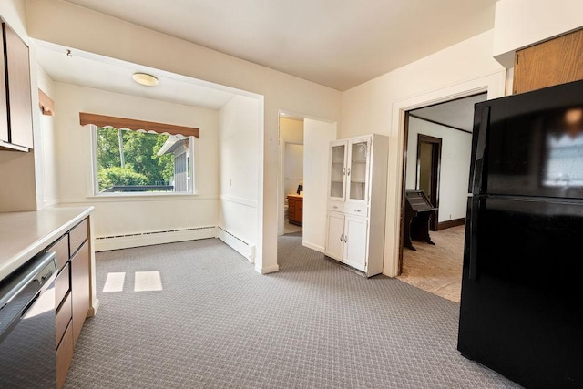 115 Spruce St W, Grey Eagle, MN 56336 - kitchen with freestanding refrigerator, baseboard heating, stainless steel dishwasher, carpet, and light countertops