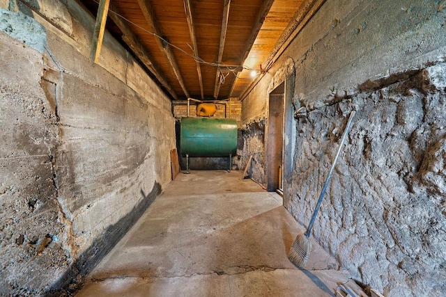 115 Spruce St W, Grey Eagle, MN 56336 - hallway featuring heating fuel and unfinished concrete flooring