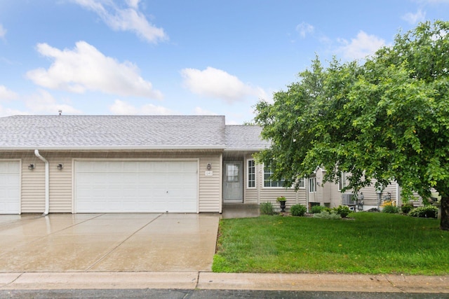 1040 Primrose Ln, Waconia, MN 55387 - view of front of property featuring an attached garage, concrete driveway, a front lawn, and a shingled roof